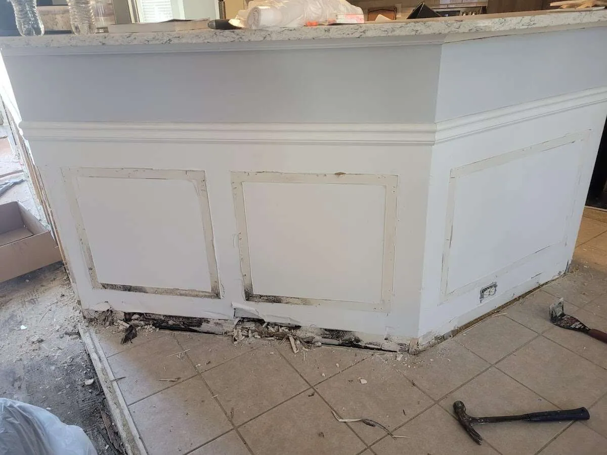 Water damage and mold on kitchen during Storm Damage Restoration in Bonadelle Ranchos